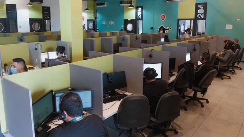 call center office with employees working